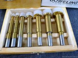 4-3/4" doweling jig with 11 bushings, plug cutters, and a Forstner bit set up to 1". Forstner bits