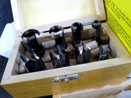 4-3/4" doweling jig with 11 bushings, plug cutters, and a Forstner bit set up to 1". Forstner bits