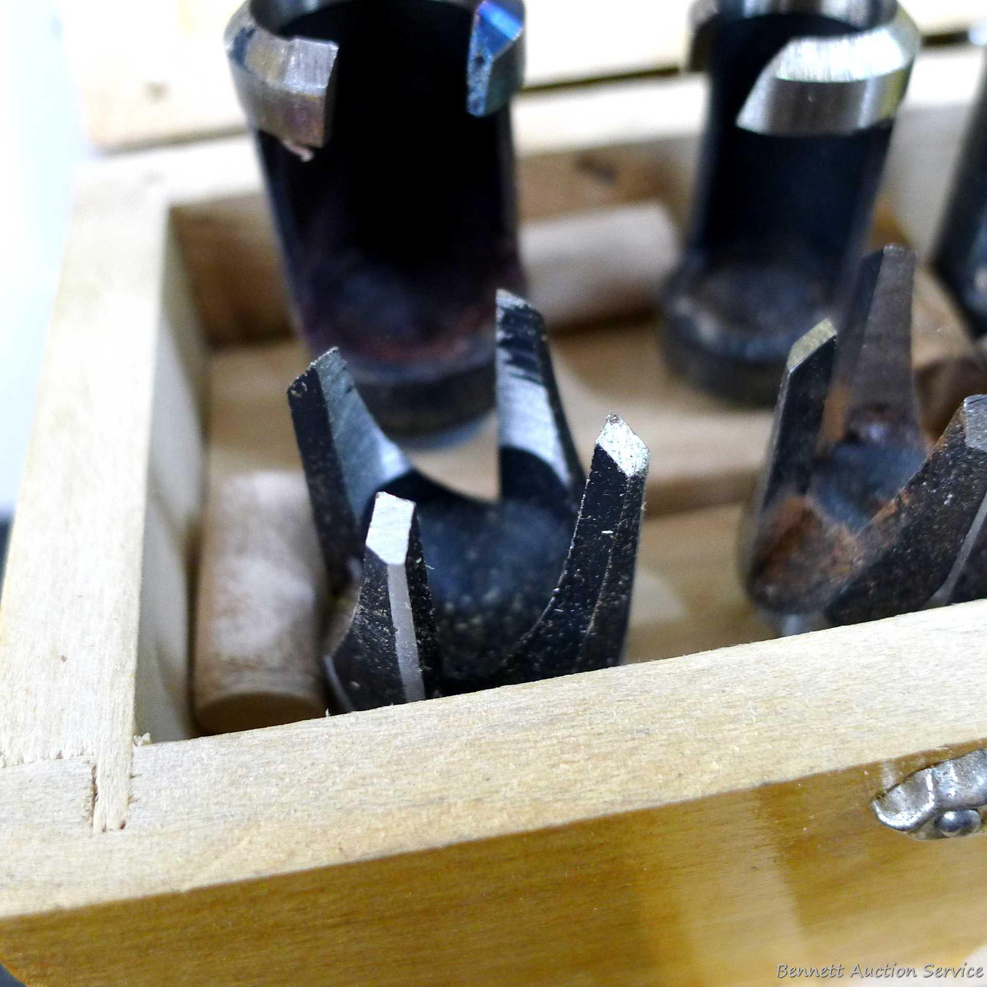 4-3/4" doweling jig with 11 bushings, plug cutters, and a Forstner bit set up to 1". Forstner bits