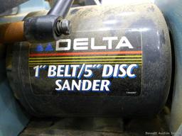 Delta 1" belt sander and 5" disc sander combo comes with manual and guide. Runs and is Model 31-080.
