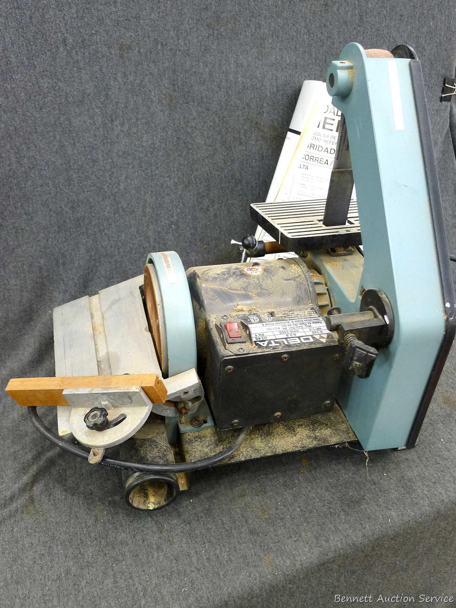 Delta 1" belt sander and 5" disc sander combo comes with manual and guide. Runs and is Model 31-080.