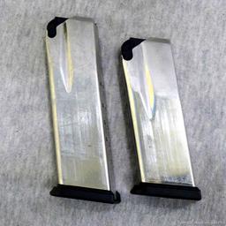 Springfield Armory .45ACP pistol magazines hold 10 and 13 rounds, larger about 5" tall.