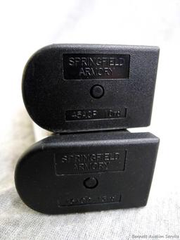 Springfield Armory .45ACP pistol magazines hold 10 and 13 rounds, larger about 5" tall.