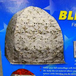 Ameristep Snow Tangle pattern ground blind cover fits over your doghouse blind.