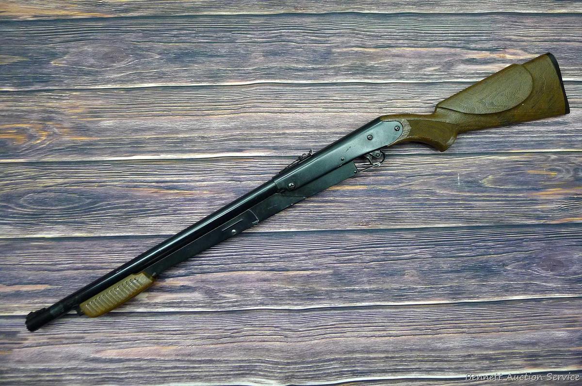 Daisy Model 225 dog-leg pump action BB rifle cocks and discharges. Stocks are sound with no chips or