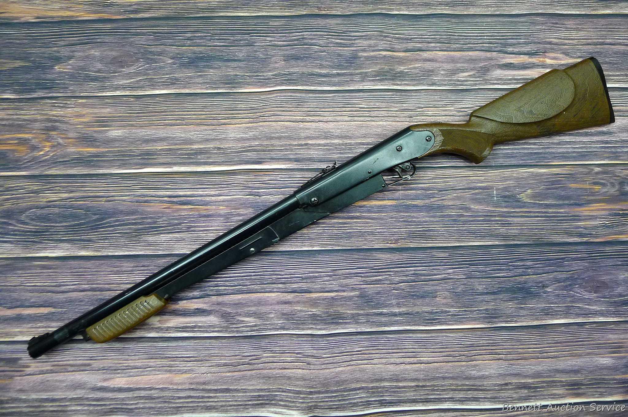 Daisy Model 225 dog-leg pump action BB rifle cocks and discharges. Stocks are sound with no chips or
