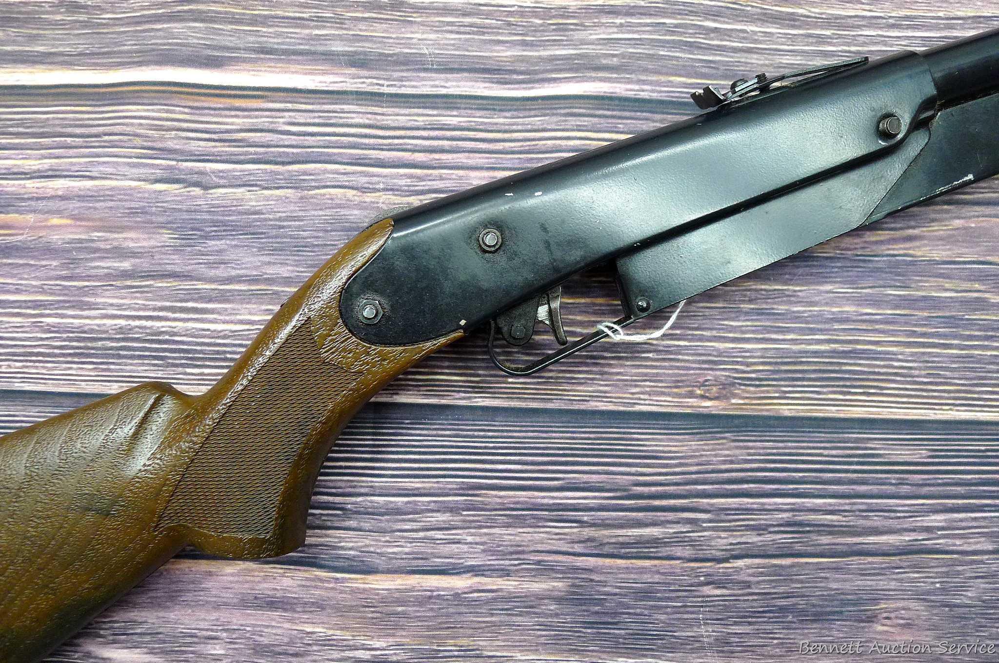 Daisy Model 225 dog-leg pump action BB rifle cocks and discharges. Stocks are sound with no chips or