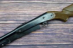 Daisy Model 225 dog-leg pump action BB rifle cocks and discharges. Stocks are sound with no chips or