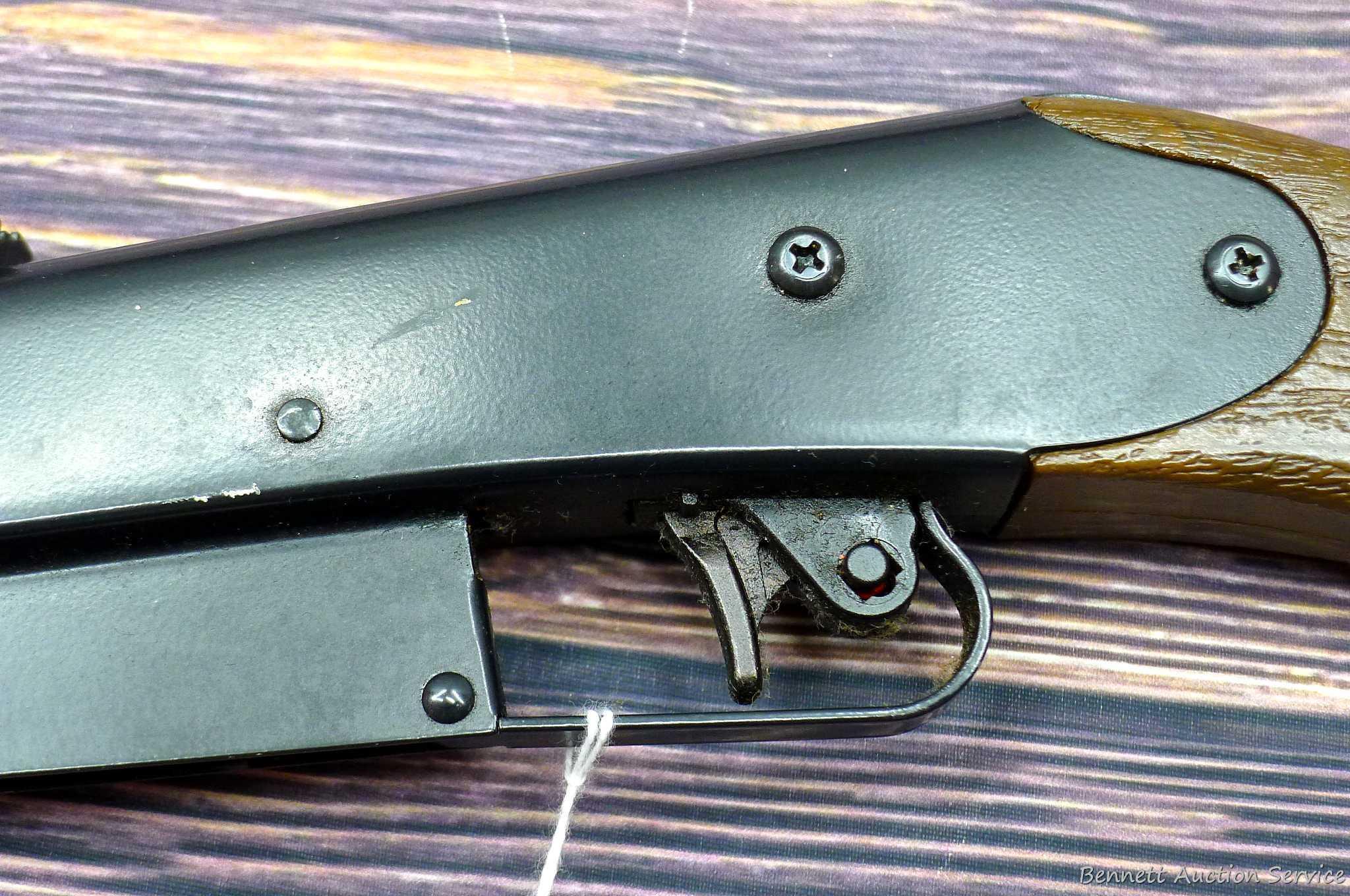 Daisy Model 225 dog-leg pump action BB rifle cocks and discharges. Stocks are sound with no chips or
