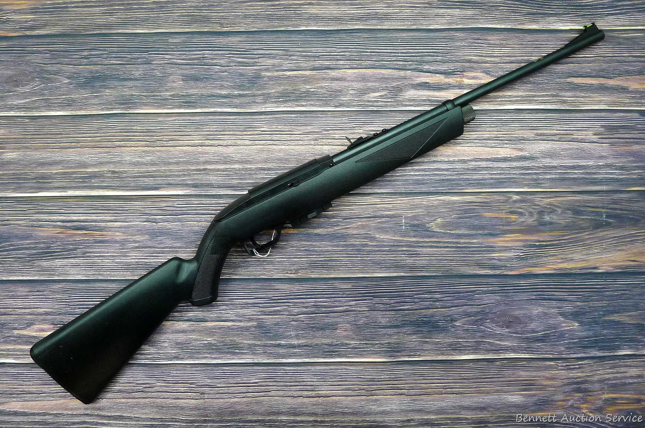 Crosman Model 1077 repeating air rifle with 12 shot rotary pellet magazine. Rifle is .177 cal and