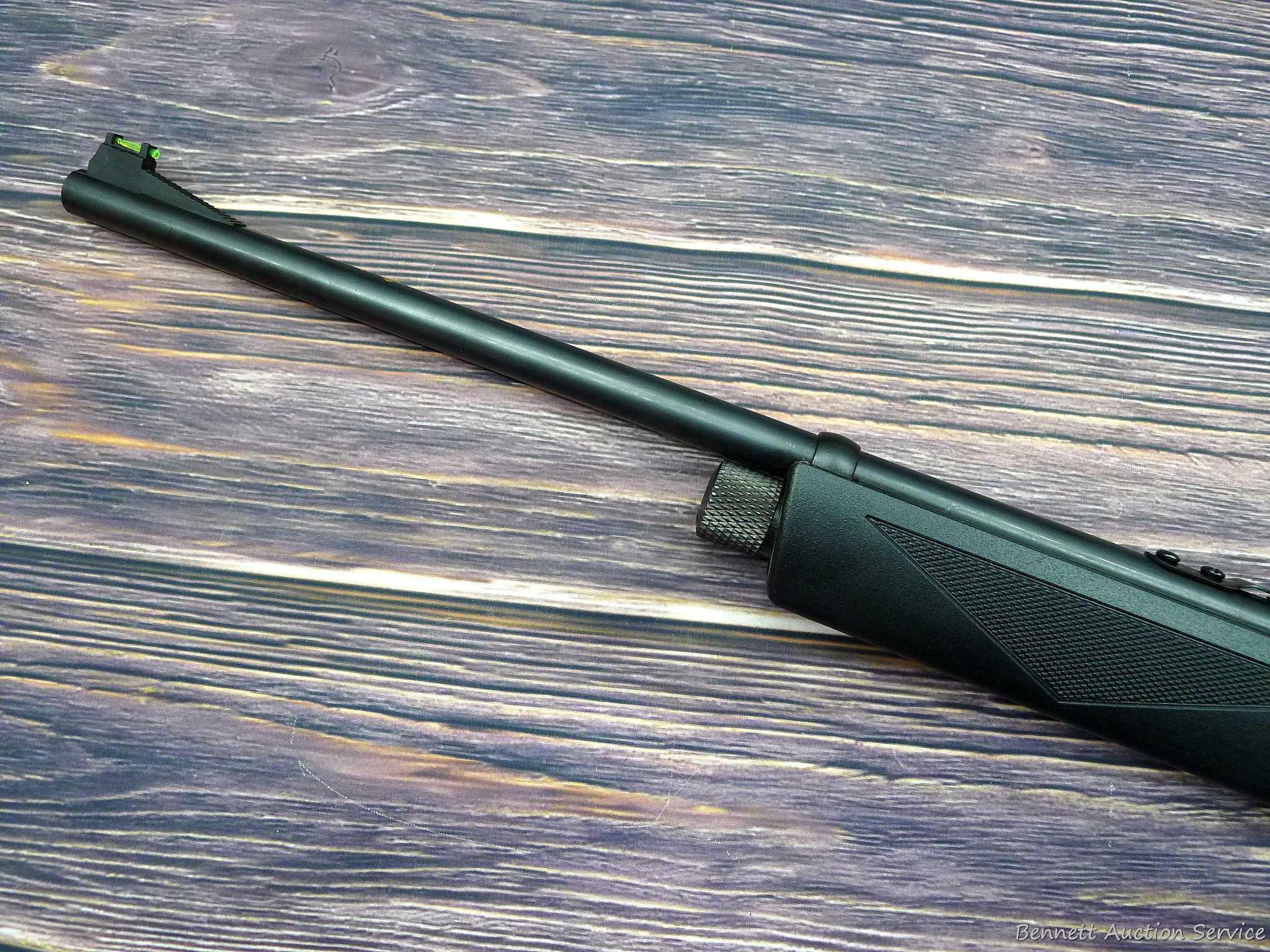 Crosman Model 1077 repeating air rifle with 12 shot rotary pellet magazine. Rifle is .177 cal and