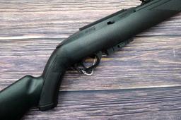 Crosman Model 1077 repeating air rifle with 12 shot rotary pellet magazine. Rifle is .177 cal and