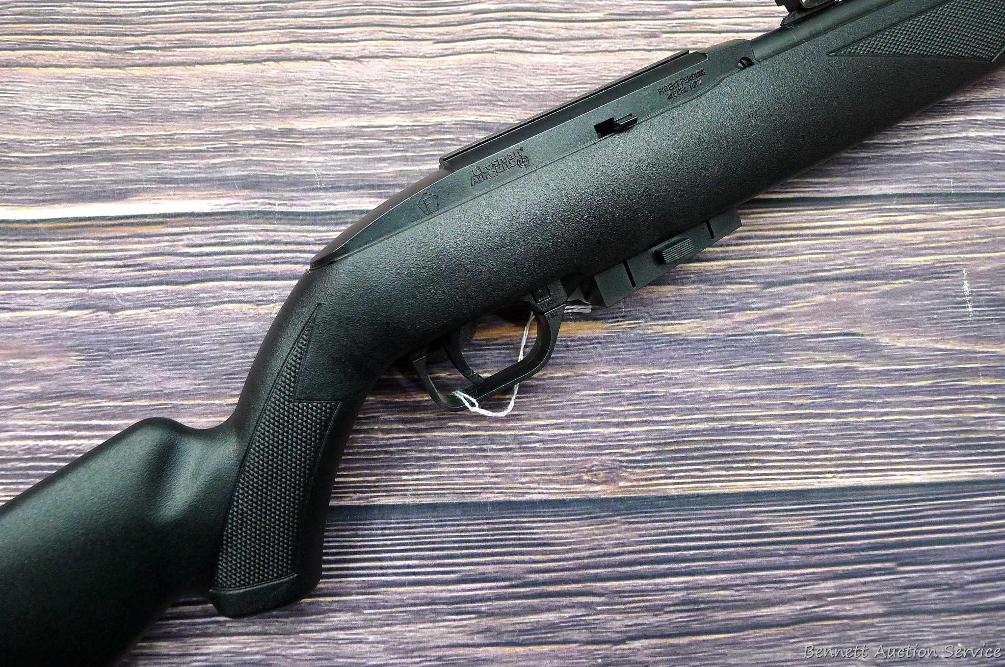 Crosman Model 1077 repeating air rifle with 12 shot rotary pellet magazine. Rifle is .177 cal and