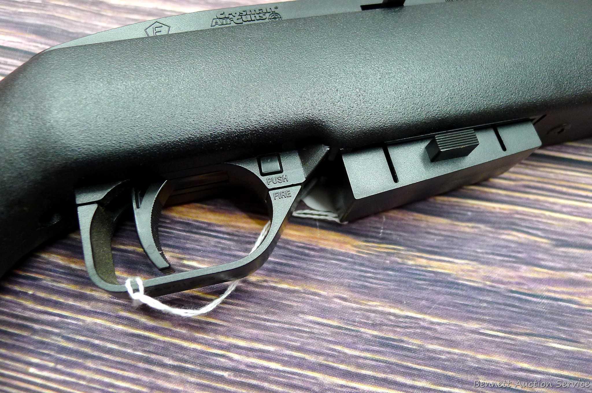 Crosman Model 1077 repeating air rifle with 12 shot rotary pellet magazine. Rifle is .177 cal and