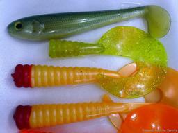 Fourteen soft bodied fishing lures up to 5-1/2".
