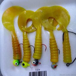 Fourteen soft bodied fishing lures up to 5-1/2".