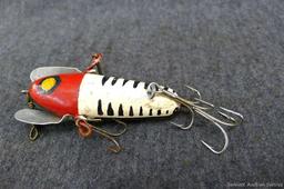 Hand painted wooden fishing lure reminds me of a Heddon Crawler. About 3-1/2" long, wipe it down to