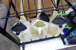 Automotive fluid jug organizer rack has space for twelve jugs - comes with 6 six quart dispenser