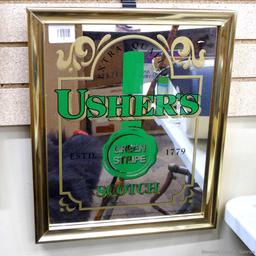 Ushers Green Stripe Scotch mirror is about 15" x 18" over frame. In good condition.