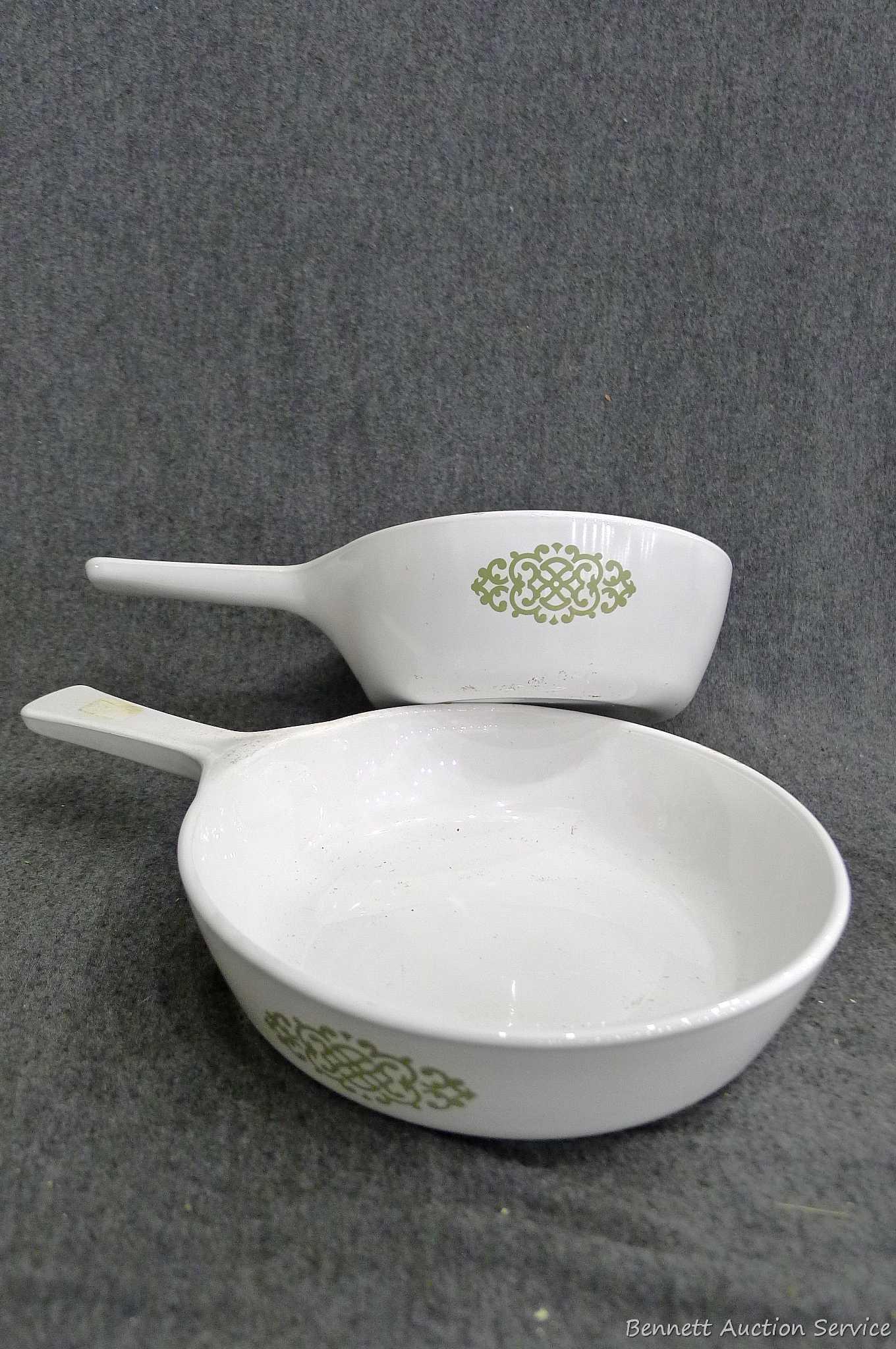 Cute Anchor Hocking dishes with matching pattern, and a couple of complimentary skillets. Largest