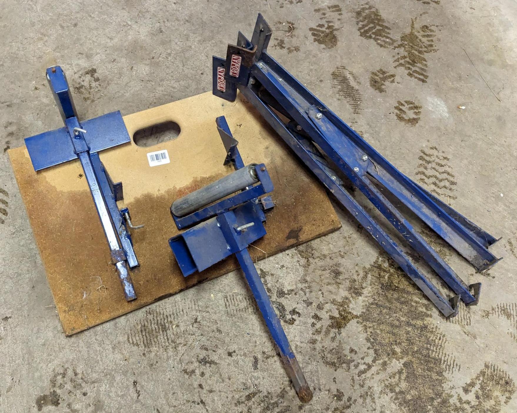 Trojan sawhorse legs, and sawhorse mountable long stock rollers. Rollers approx 10" wide.