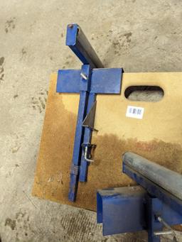 Trojan sawhorse legs, and sawhorse mountable long stock rollers. Rollers approx 10" wide.