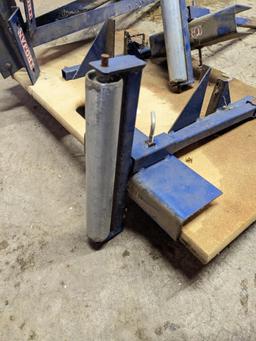 Trojan sawhorse legs, and sawhorse mountable long stock rollers. Rollers approx 10" wide.