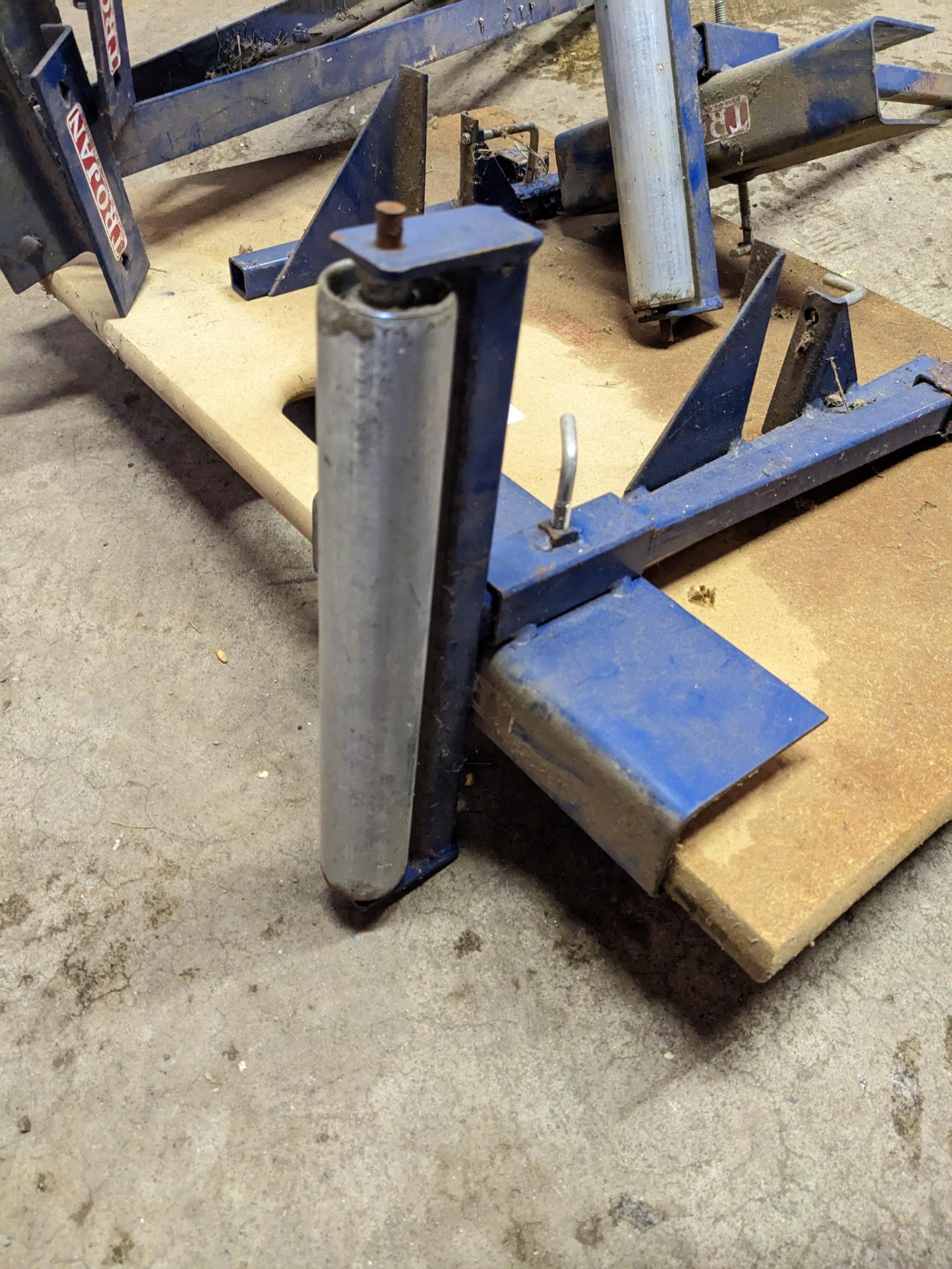 Trojan sawhorse legs, and sawhorse mountable long stock rollers. Rollers approx 10" wide.