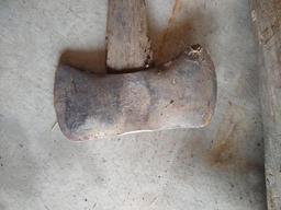 Two double bit axes and a double sided pick axe. Larger double bit axe has a 36" long handle and is