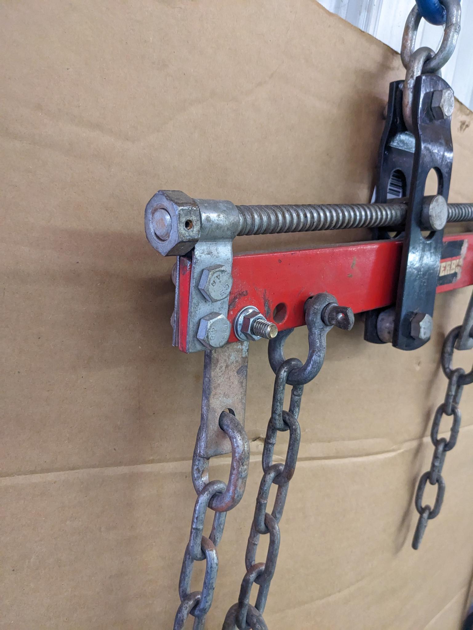 Engine puller / cherry picker tilt mechanism is about 17" wide. Once you use one of these, you'll