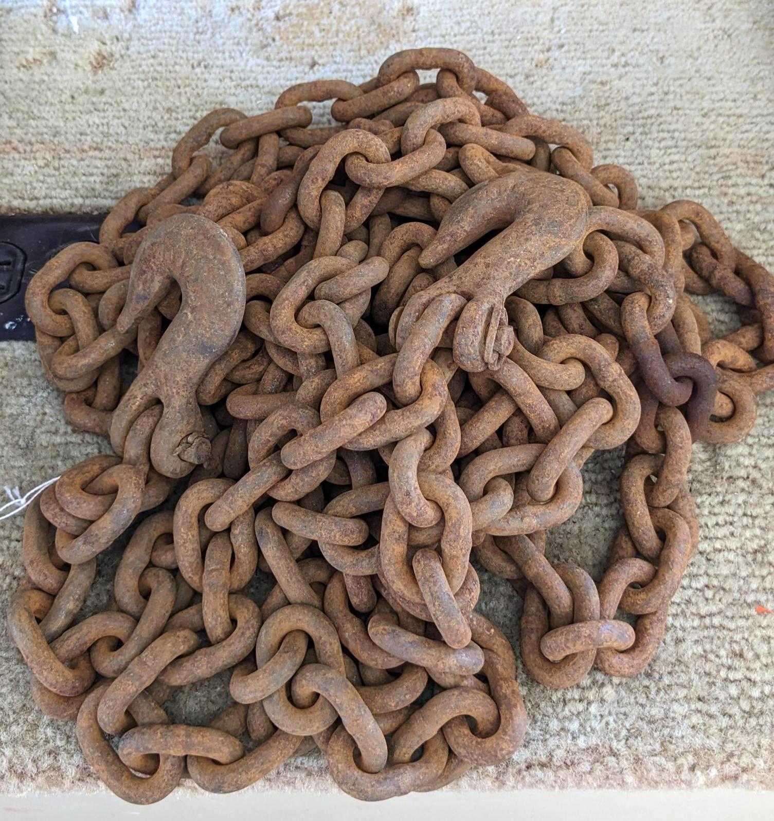 20' of 3/8" chain with 2 grab hooks, no repairs noted.