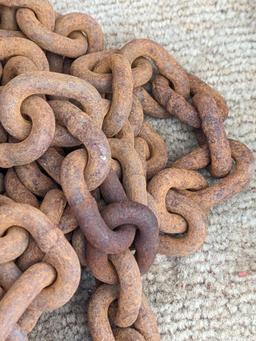 20' of 3/8" chain with 2 grab hooks, no repairs noted.