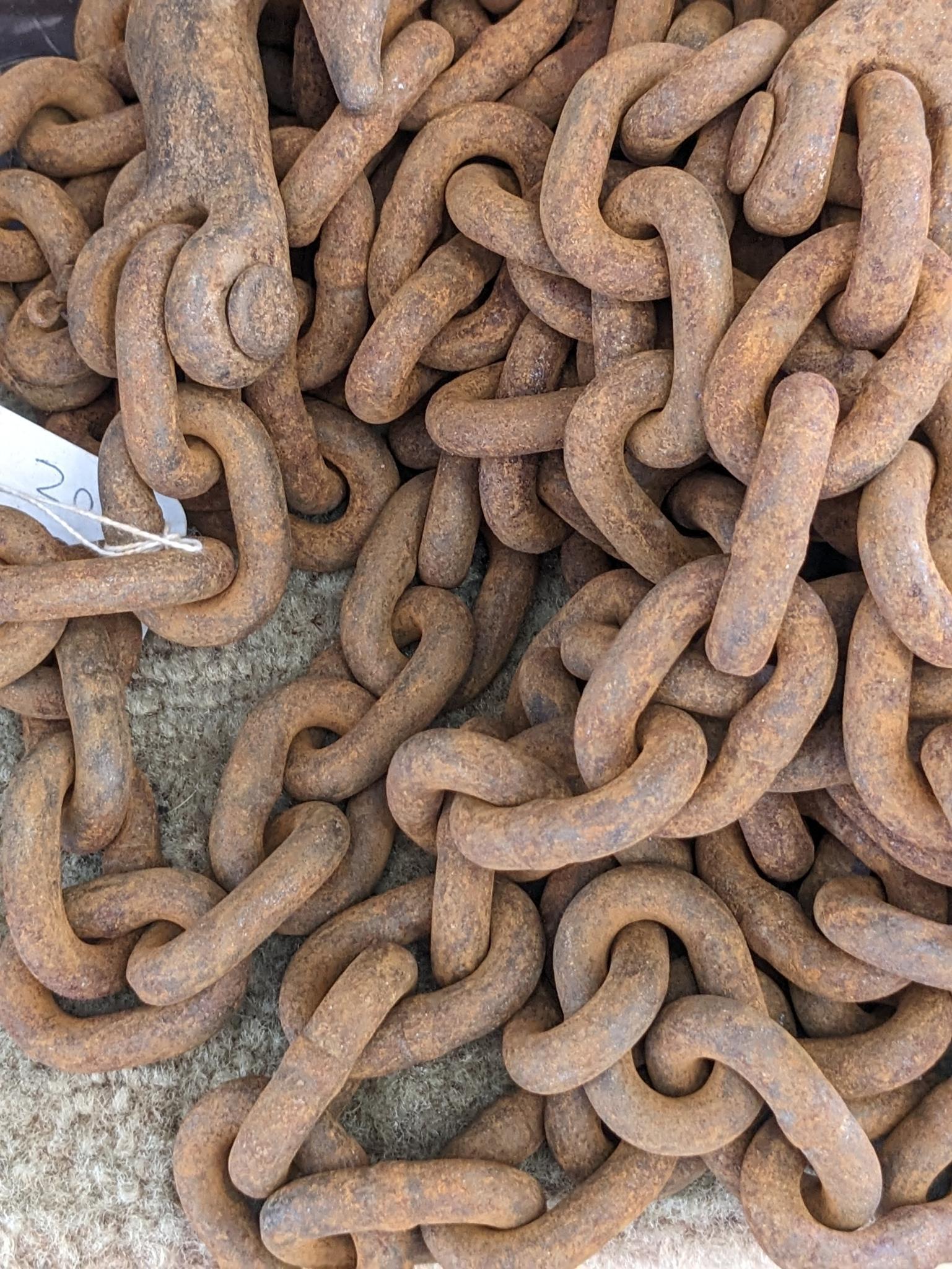 20' of 3/8" chain with 2 grab hooks, no repairs noted.
