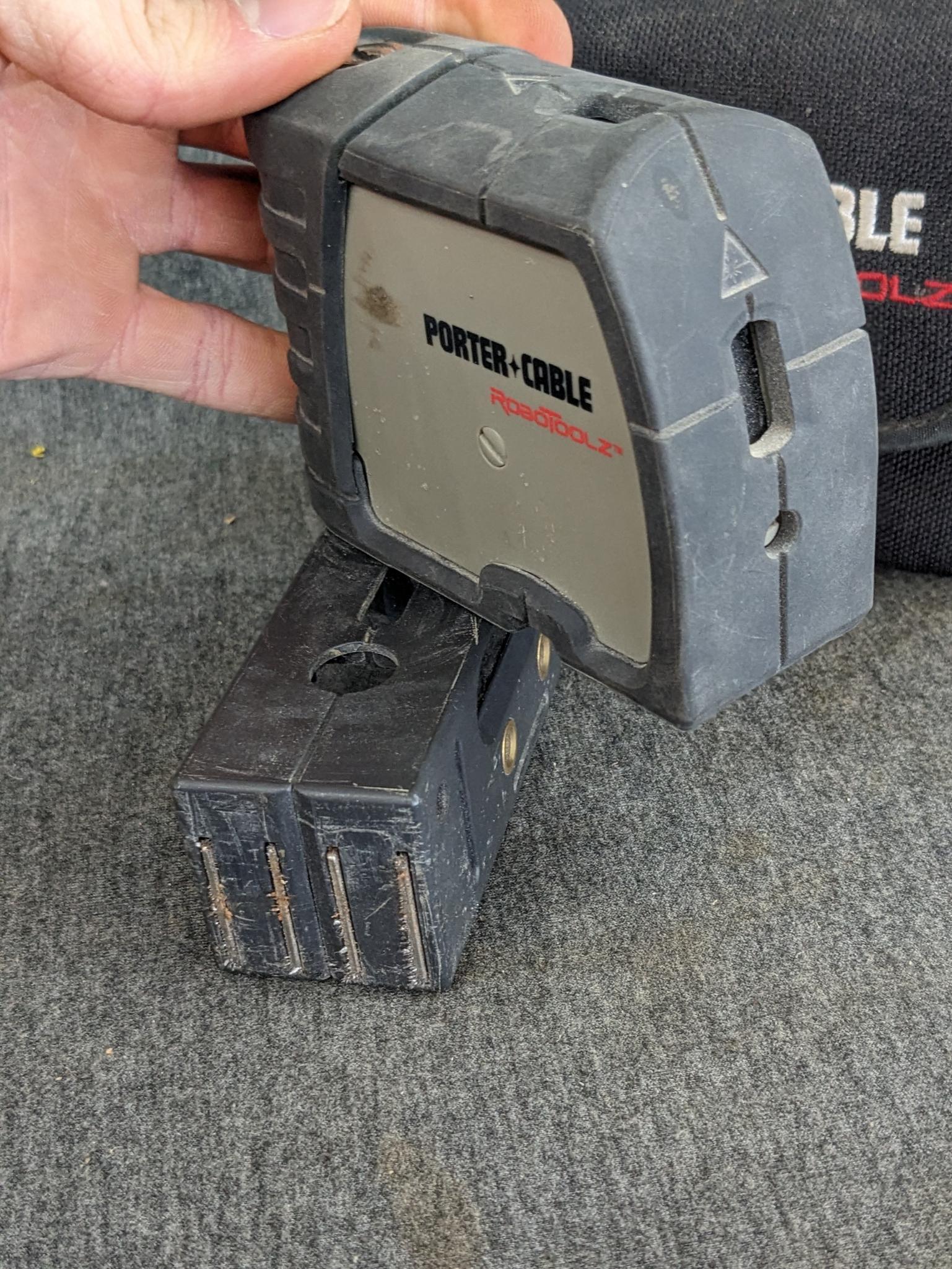 Porter Cable RoboToolz 3 beam self leveling laser level. Appears in good condition, comes with a