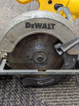 DeWalt 18v hammer drill, circular saw w/ 5-3/8" blade, and a work light. All tools run.