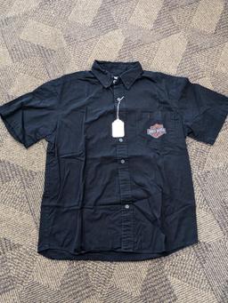 Two Harley-Davidson button-up shirts. Both appear in good condition and are sizes medium and large.