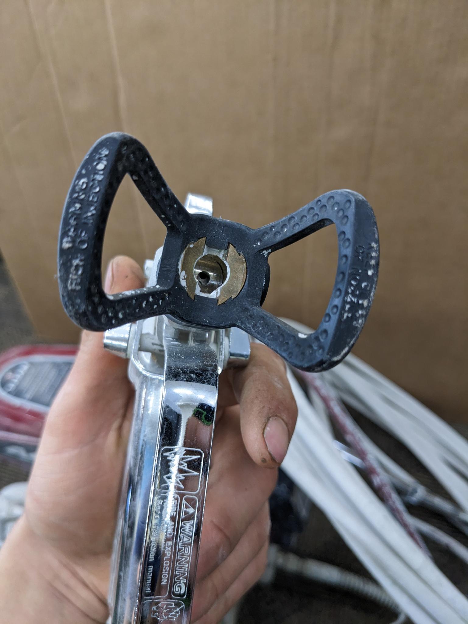 Titan Impact 440 paint sprayer comes with extra Titan reversible tips/seals and approx 45' of hose.