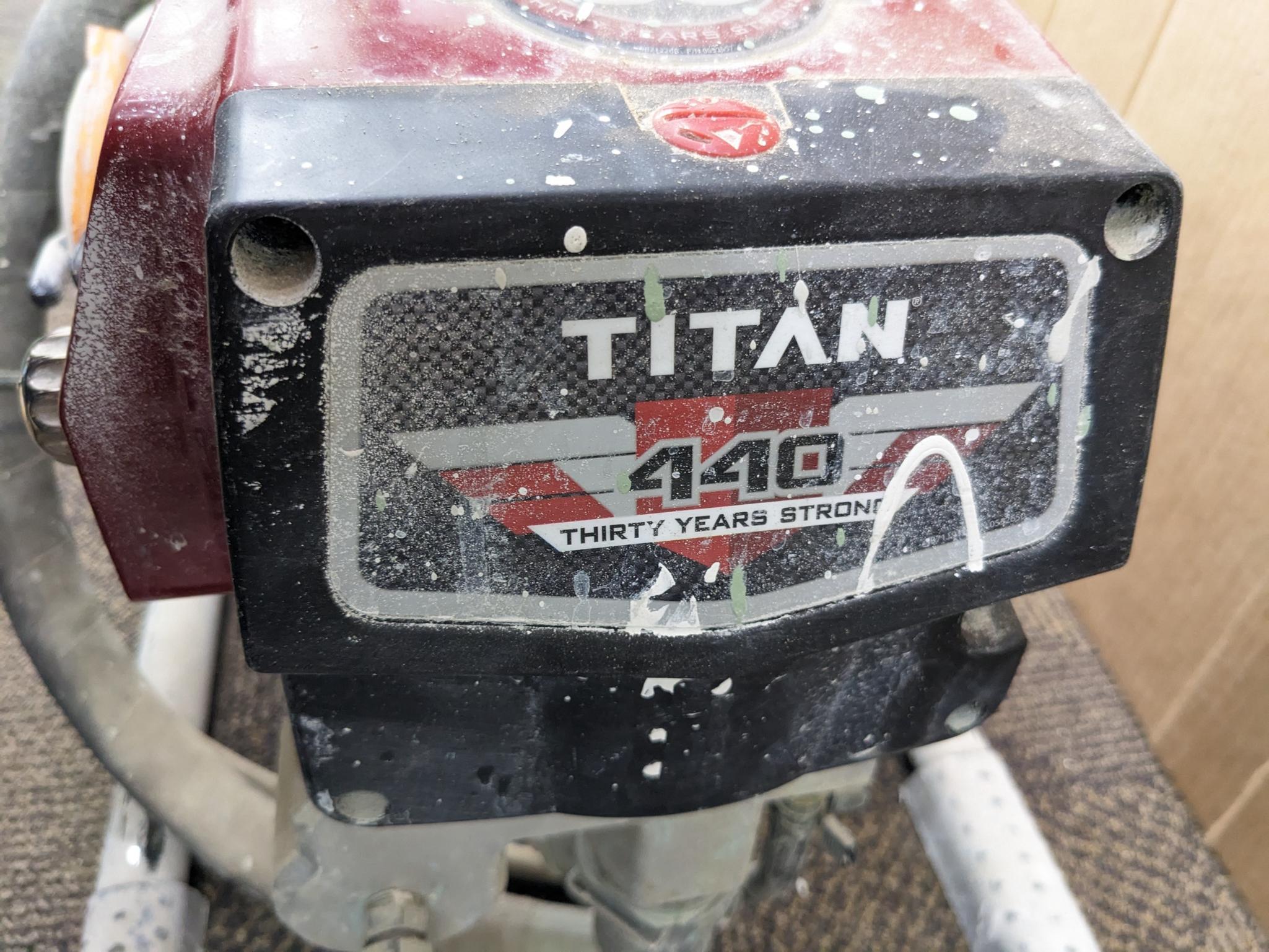 Titan Impact 440 paint sprayer comes with extra Titan reversible tips/seals and approx 45' of hose.