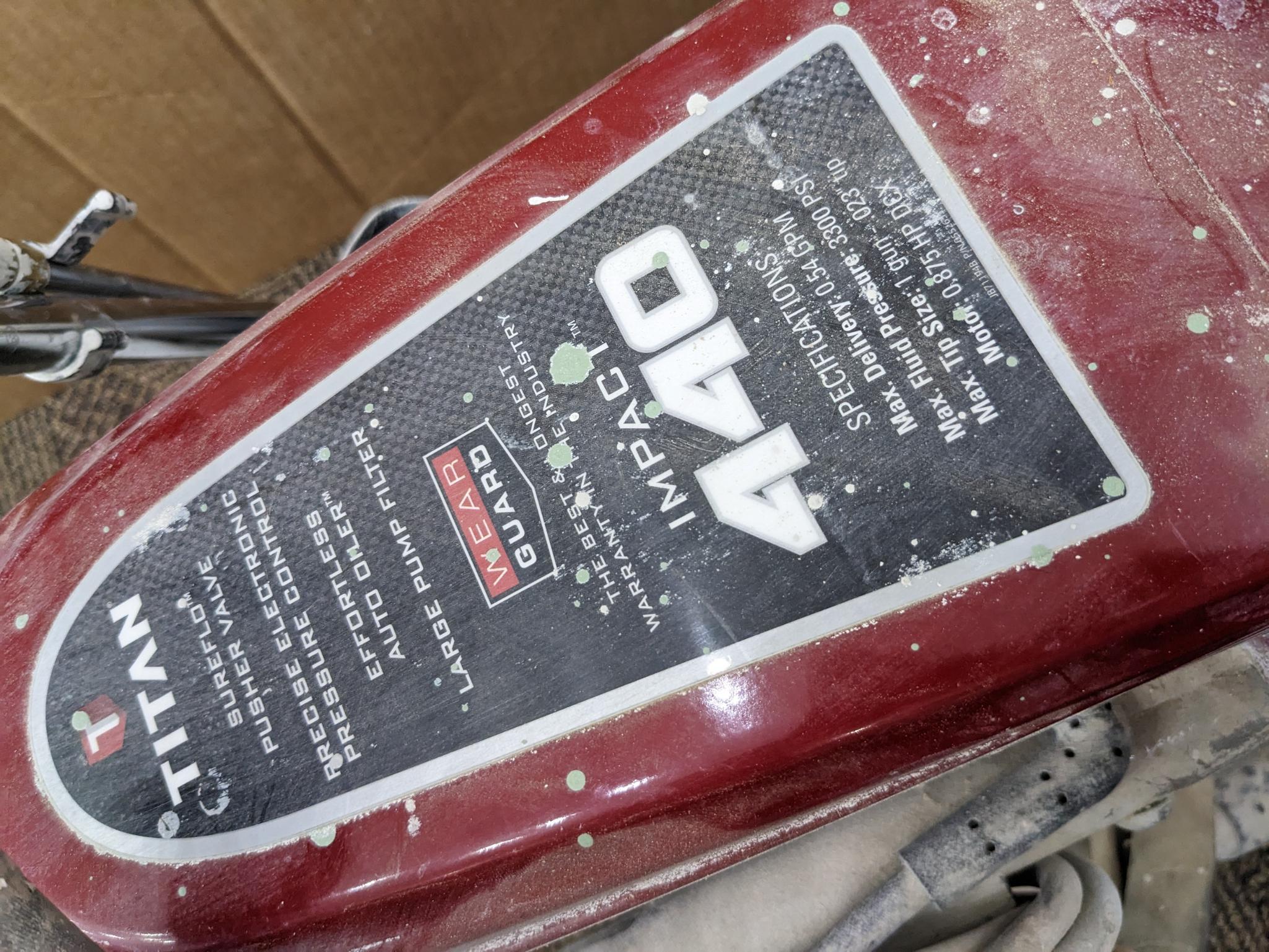 Titan Impact 440 paint sprayer comes with extra Titan reversible tips/seals and approx 45' of hose.
