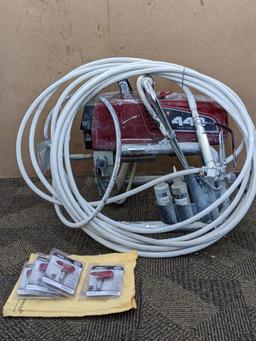 Titan Impact 440 paint sprayer comes with extra Titan reversible tips/seals and approx 45' of hose.