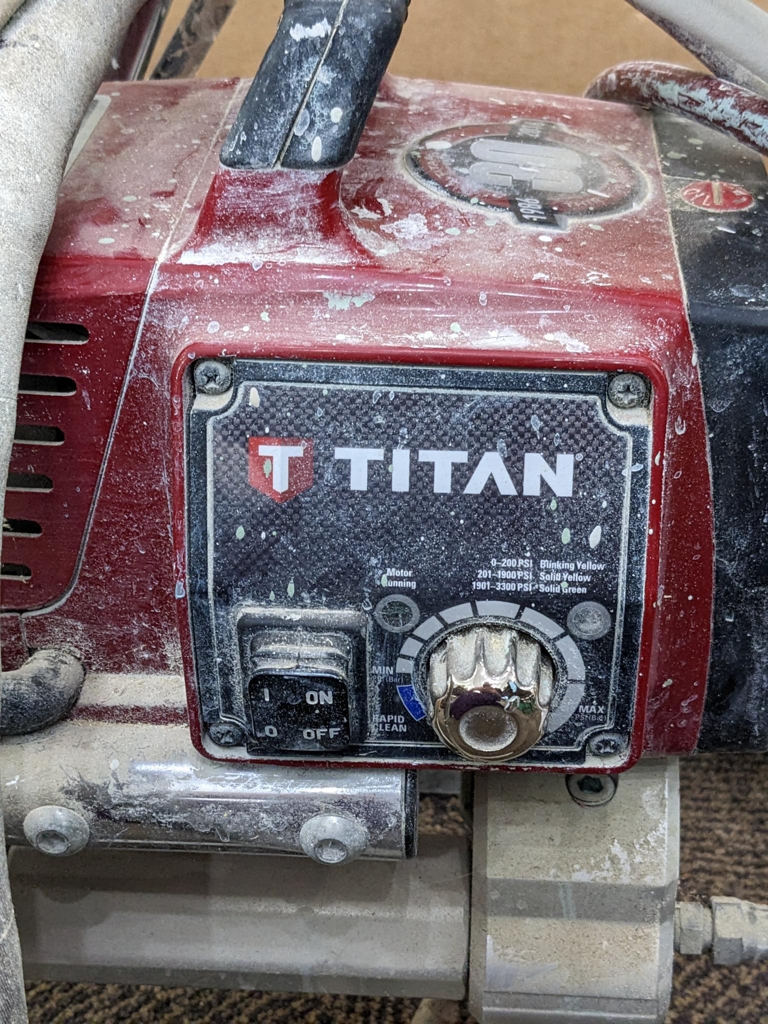 Titan Impact 440 paint sprayer comes with extra Titan reversible tips/seals and approx 45' of hose.
