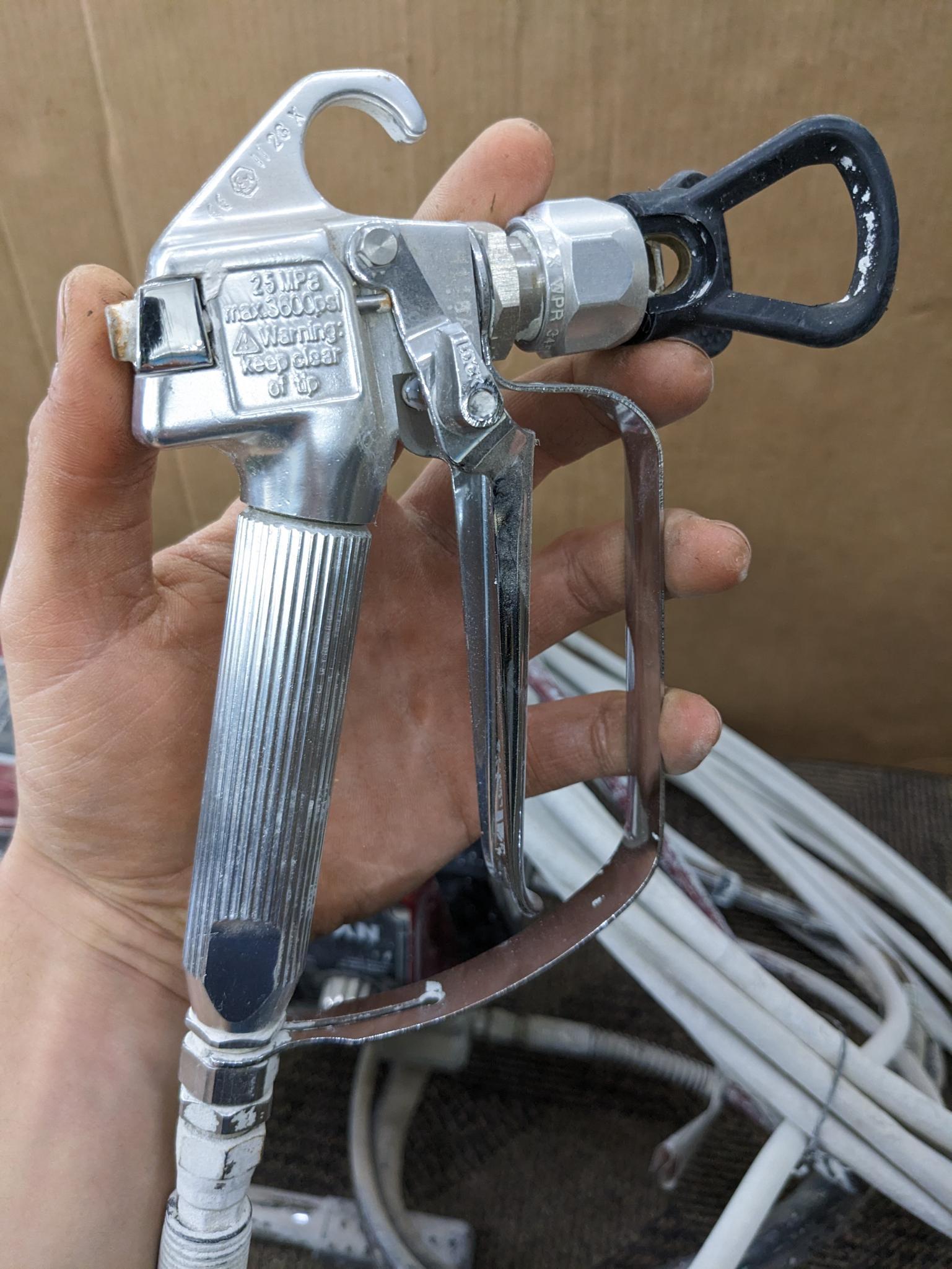 Titan Impact 440 paint sprayer comes with extra Titan reversible tips/seals and approx 45' of hose.