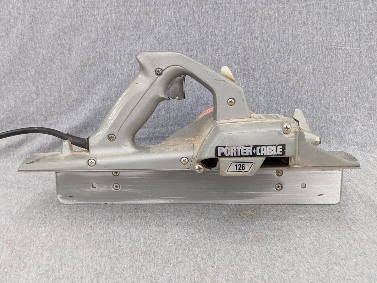 Porter Cable heavy duty Porta-Plane is Model 126. Comes with box, wrench, manual. Runs and cord is