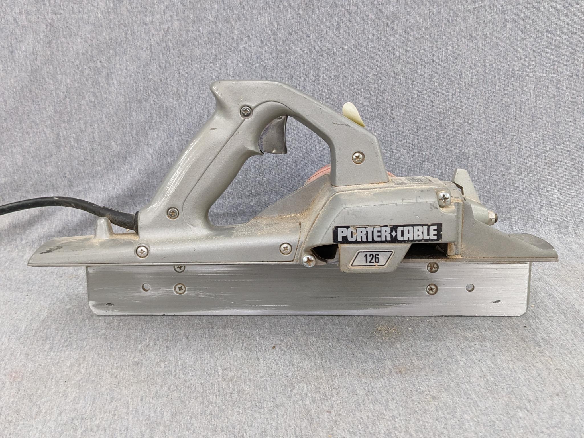 Porter Cable heavy duty Porta-Plane is Model 126. Comes with box, wrench, manual. Runs and cord is