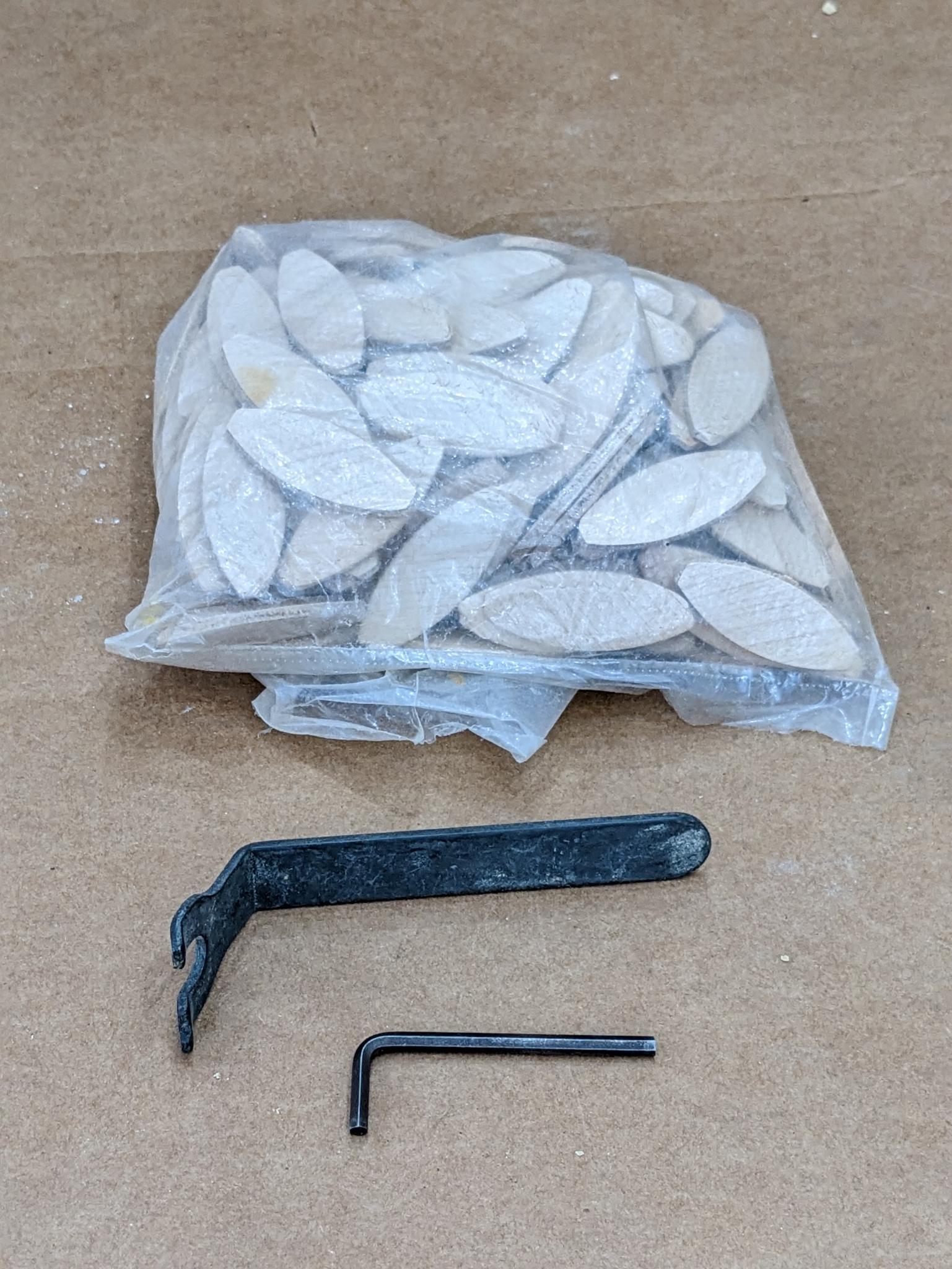 Porter Cable biscuit or joint plate joiner model 555, comes with wrenches, biscuits, and a steel