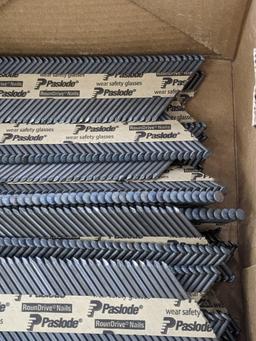 Partial box of Paslode 30 degree smooth shank nails, are 2-3/8" long.