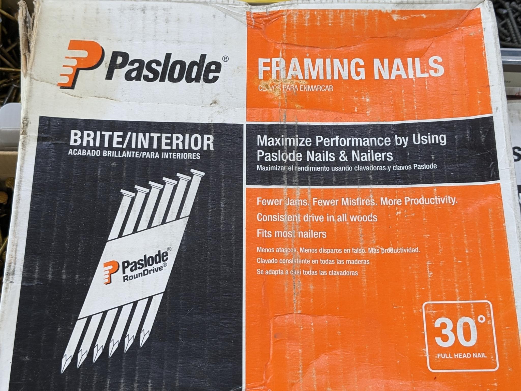 Partial box of Paslode 30 degree smooth shank nails, are 2-3/8" long.