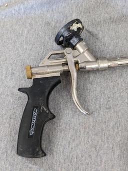 Three foam spraying guns, one labeled Great Stuff pro series 13, comes with four extra tips.