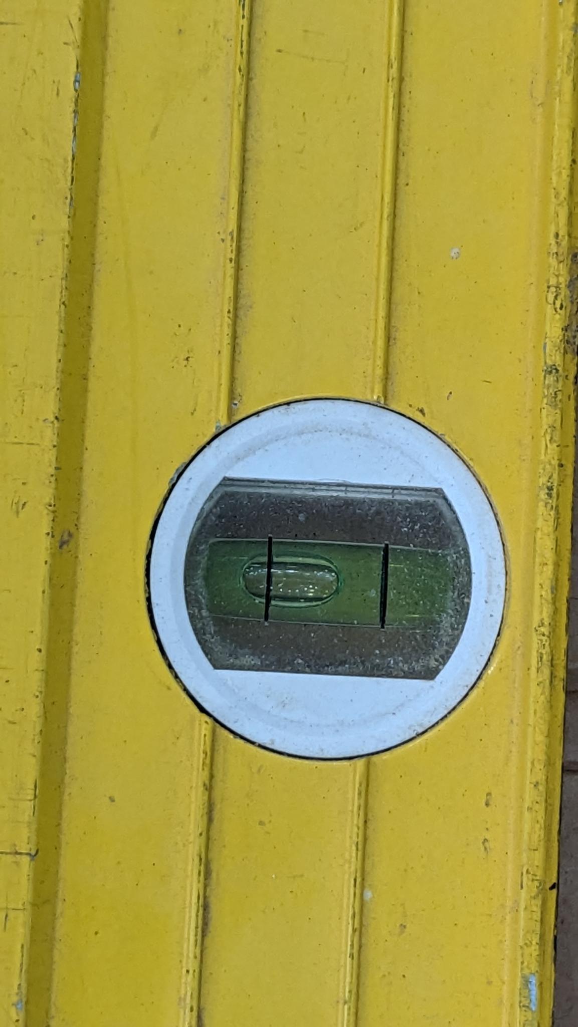 Stabila 12' extension level. Sticks slightly when closing. Vials and windows are good.