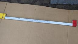 Stabila 12' extension level. Sticks slightly when closing. Vials and windows are good.